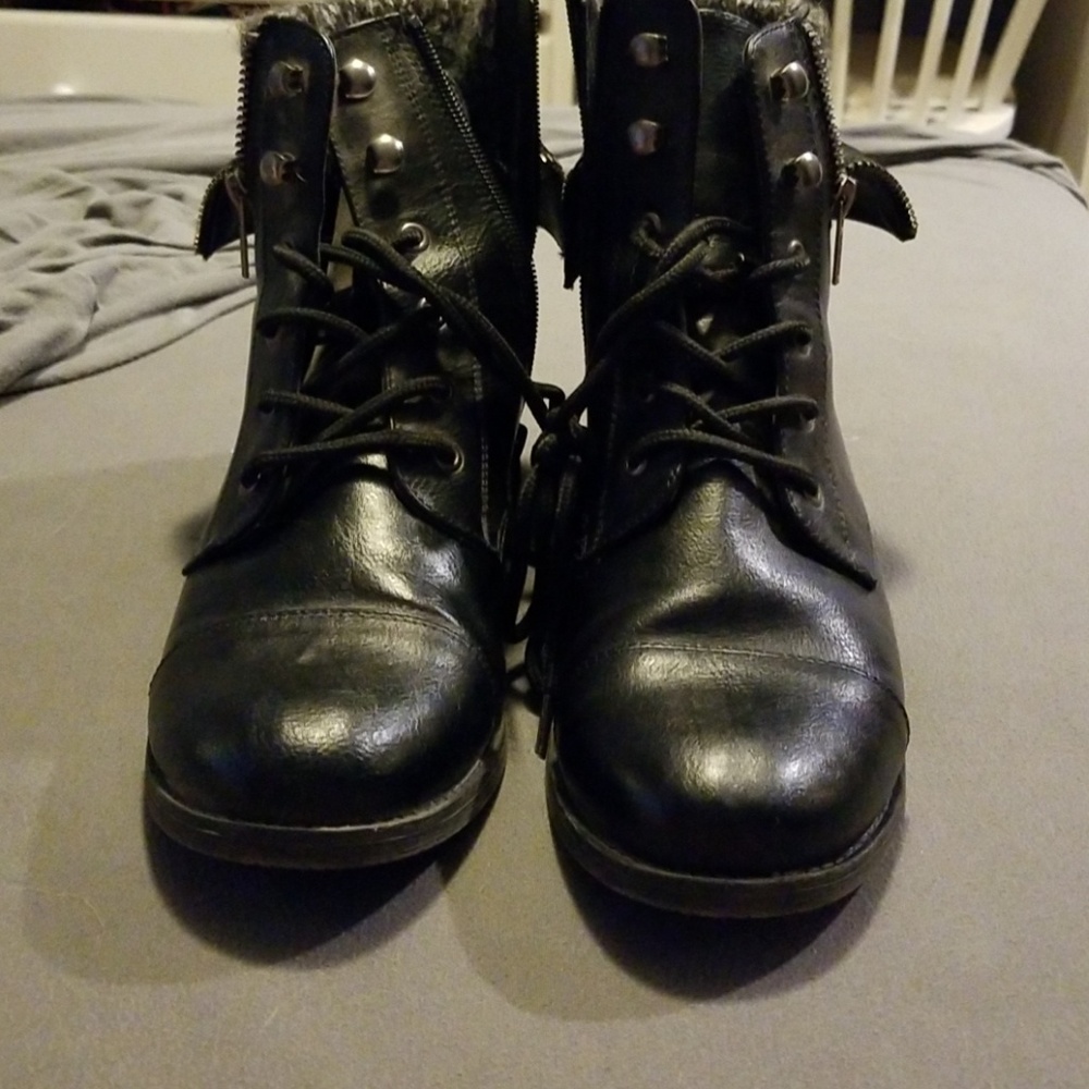 Black combat Boots with Sweater/Zipper detail.
